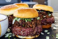 Smoked Birria-Style Burgers with Gooey Cheese and Consommé Dip