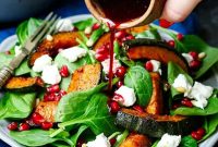 Roasted Kabocha & Goat Cheese Salad with Pomegranate Dressing