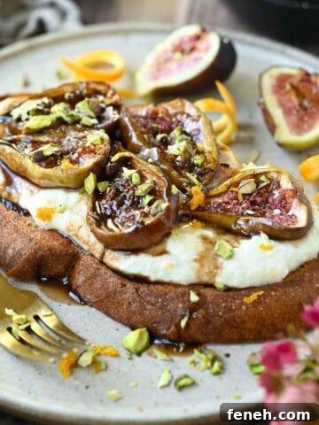 Close-up of fig toast on a beige plate.