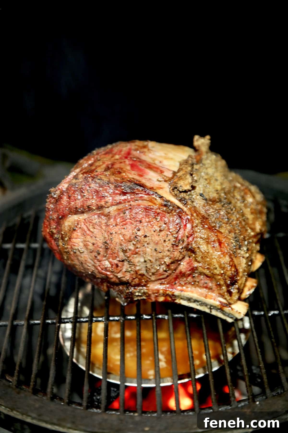 Prime Rib Roast grilled on a ceramic grill.