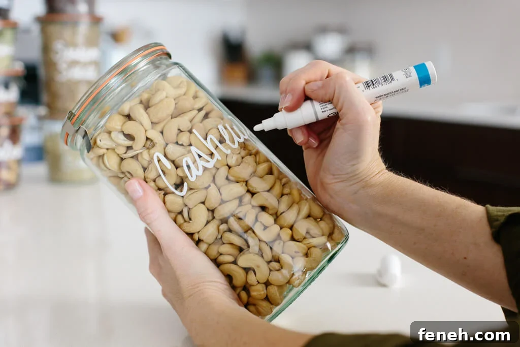 Pantry organization ideas - labeled glass jars on shelves.