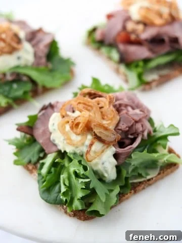 An open roast beef sandwich on a plate