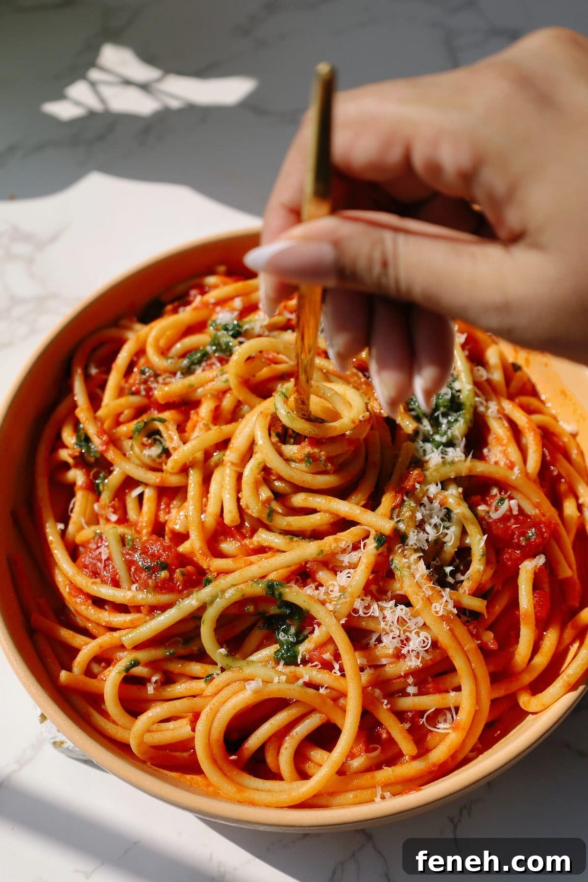 pasta pomodoro twirled on a fork