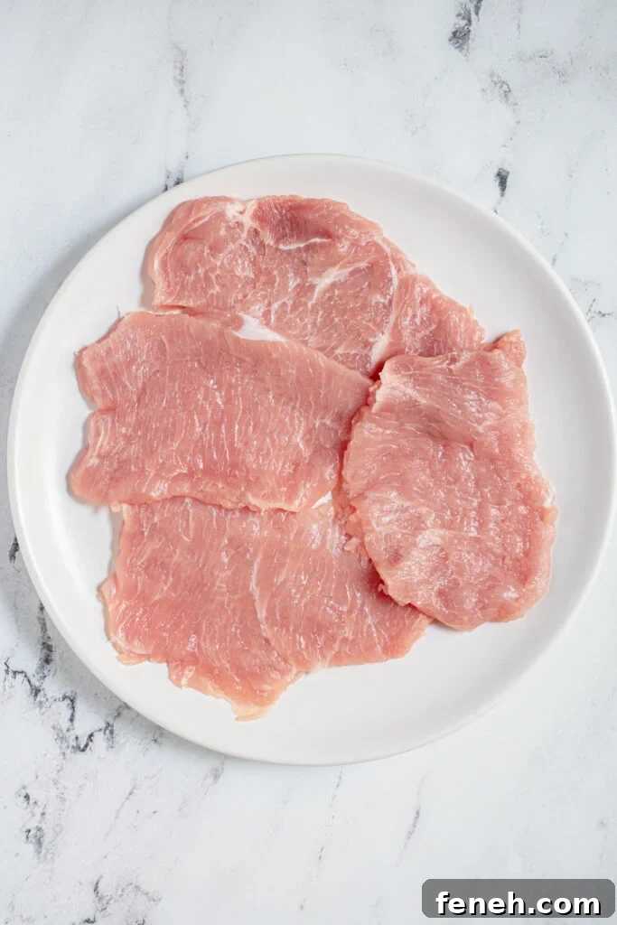 4 pork cutlets with fat removed and pounded down to about 1/4 inch thickness.