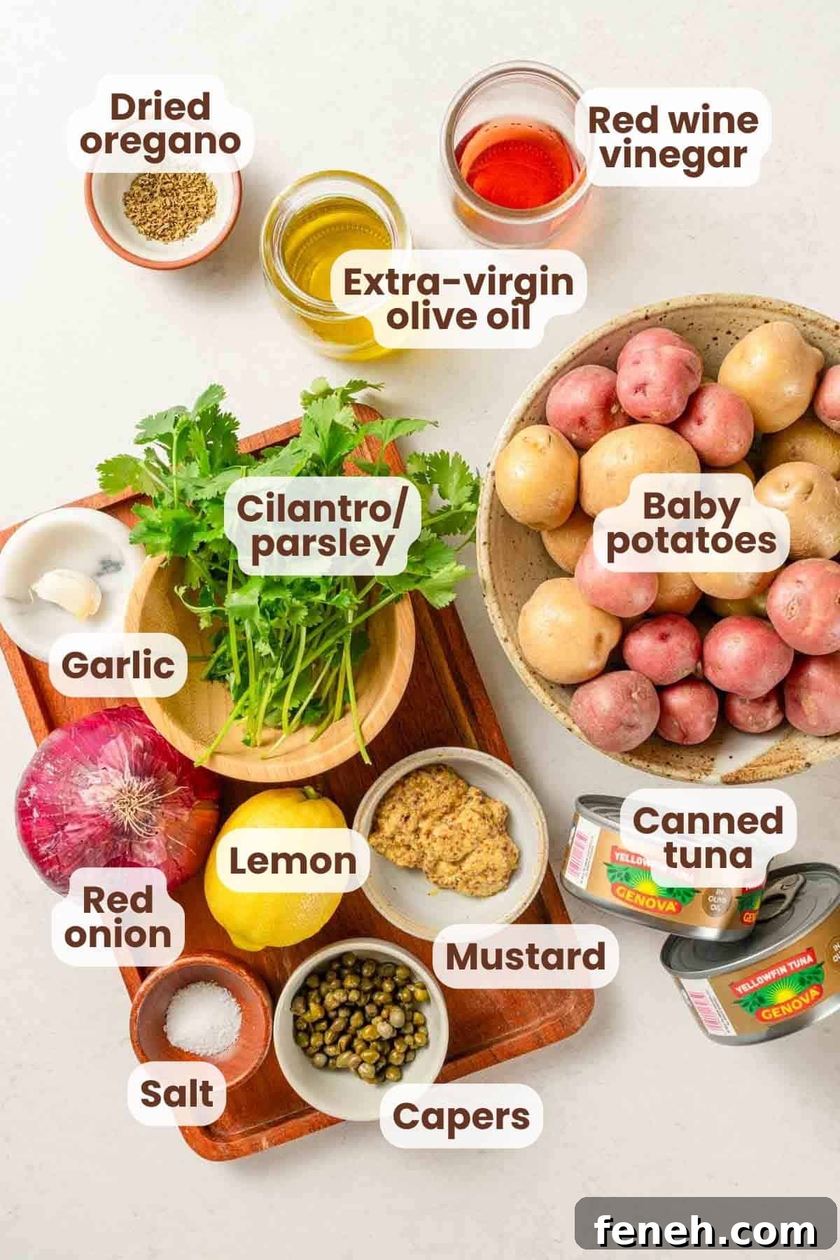 ingredients for tuna potato salad with text labels.