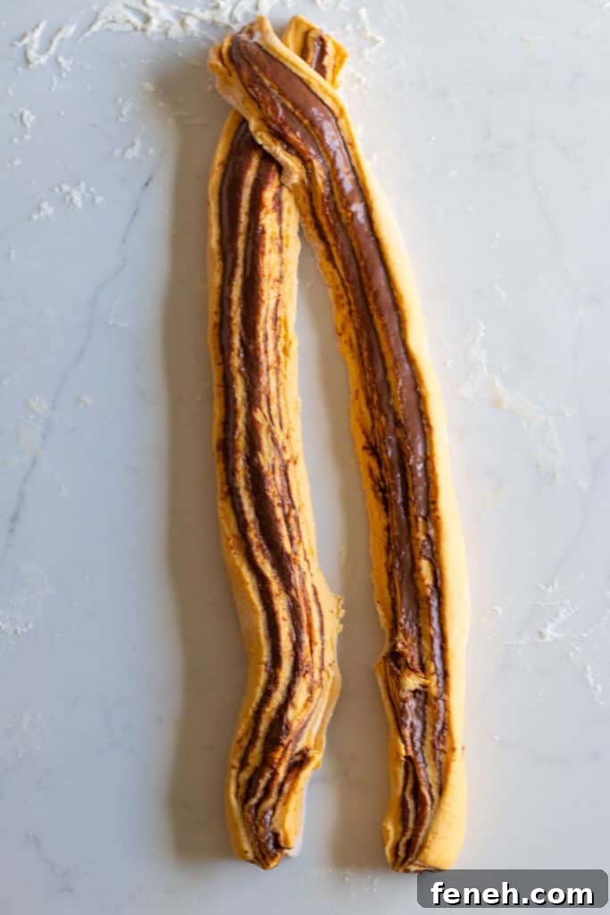 pumpkin nutella babka dough rolled and sliced down middle