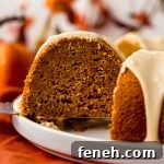 A slice of pumpkin Bundt cake on a platter.