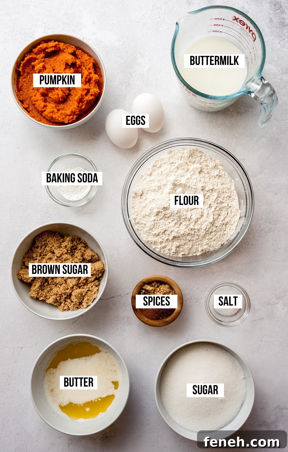Aerial photo of ingredients to make pumpkin cake with text overlay labeling each ingredients.