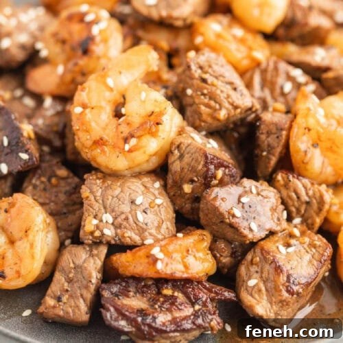 Steak and shrimp plated together