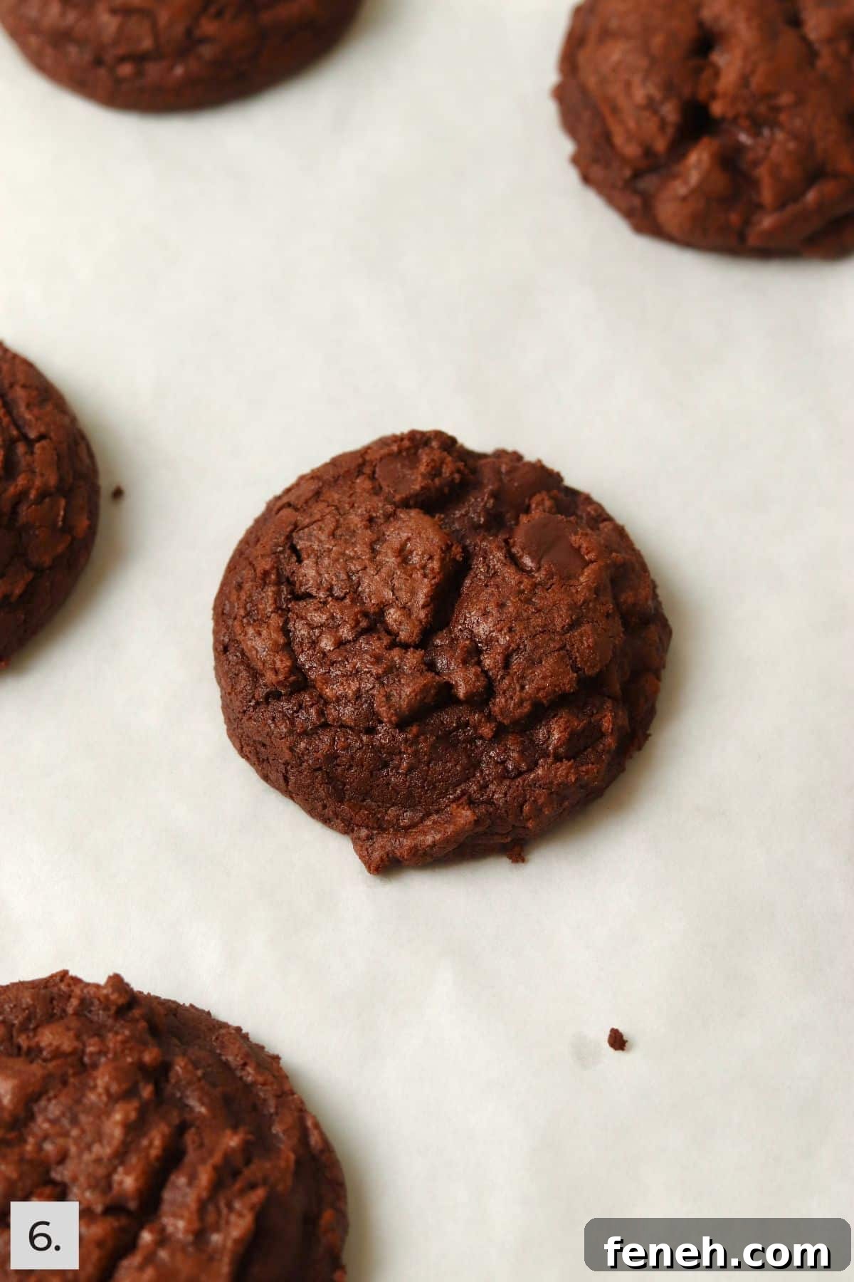 Baked brownie cookie on a baking sheet.