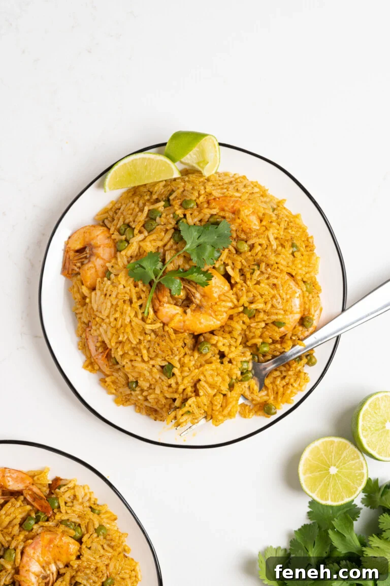 Rice with shrimp on a plate.