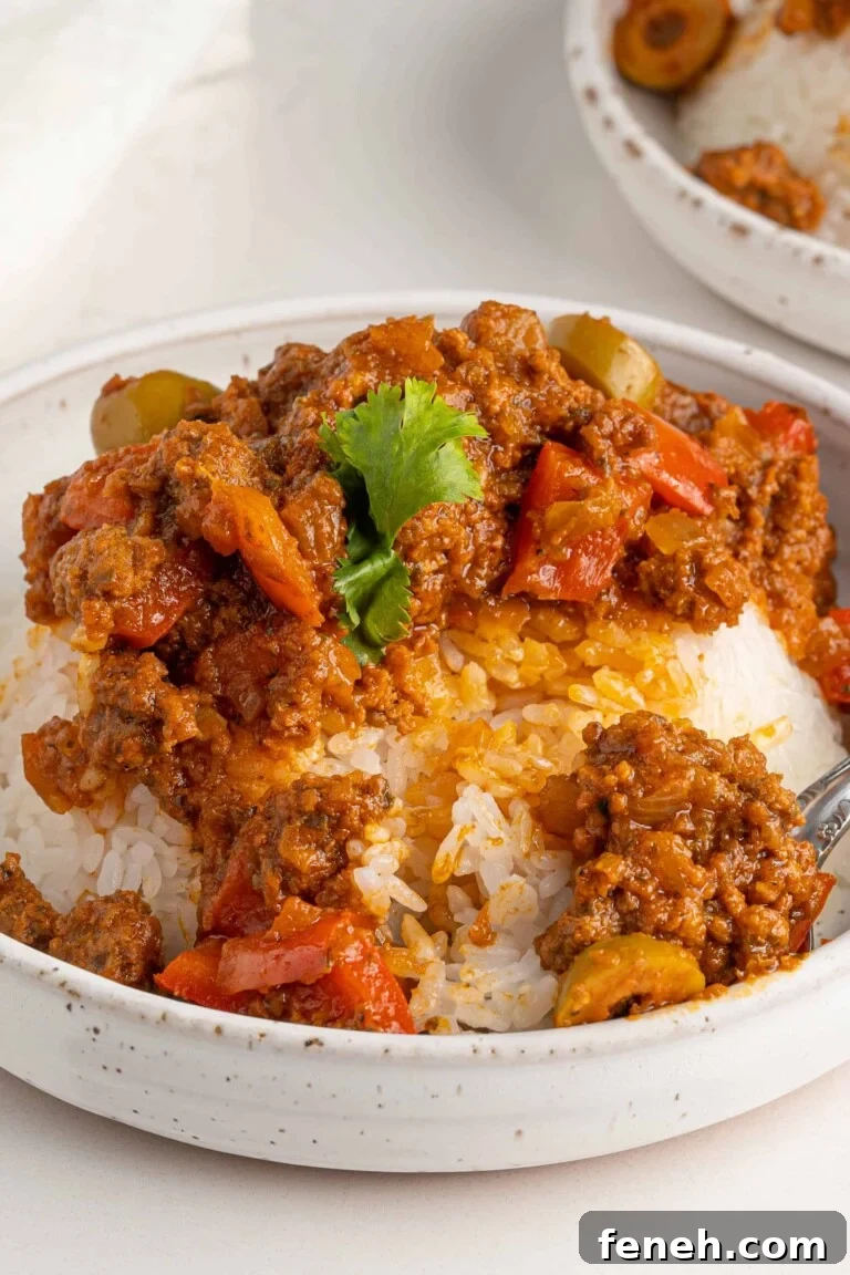 picadillo in bowls on a white table
