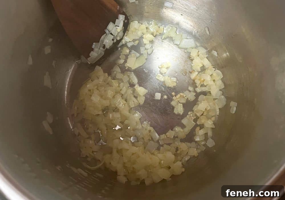 onions and garlic sauteed in butter in the insert pot of the Instant Pot.