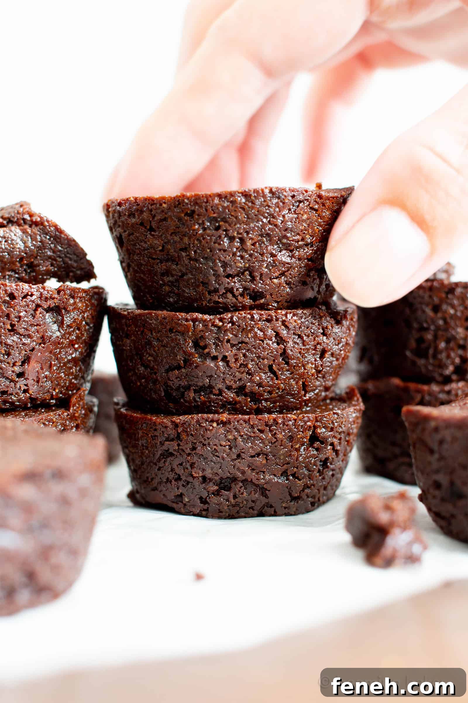 Mini Vegan Brownie Bites Recipe (V, GF): an easy recipe for soft, fudgy ‘n moist two bite mini brownies bursting with rich, chocolate flavor. Made with healthy, whole ingredients. #Vegan #GlutenFree #DairyFree #Brownies #VeganBaking #Chocolate | Recipe at BeamingBaker.com