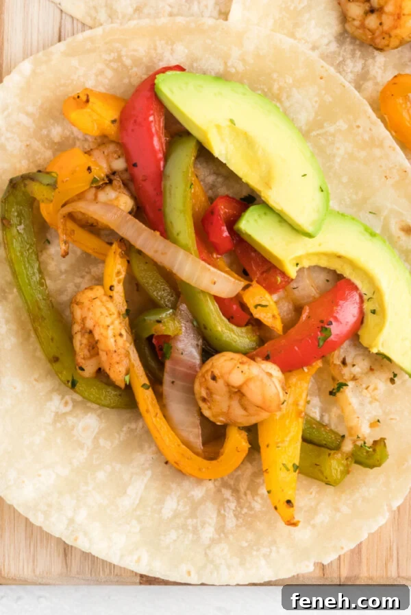 Overhead of shrimp fajita ready to be eaten.