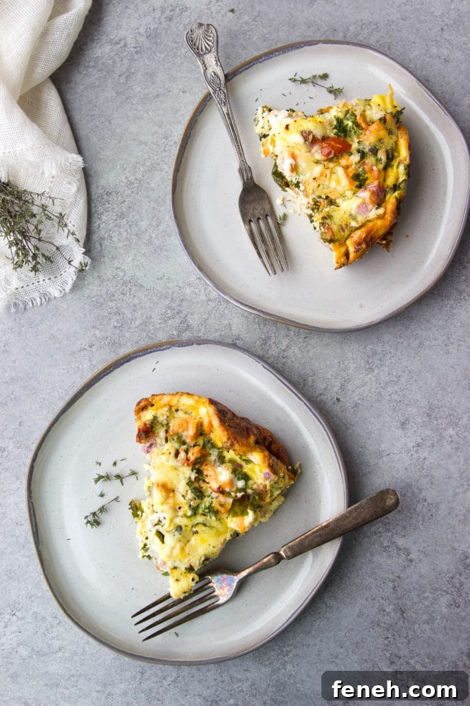 Two plates with a slice of the smoked salmon breakfast casserole