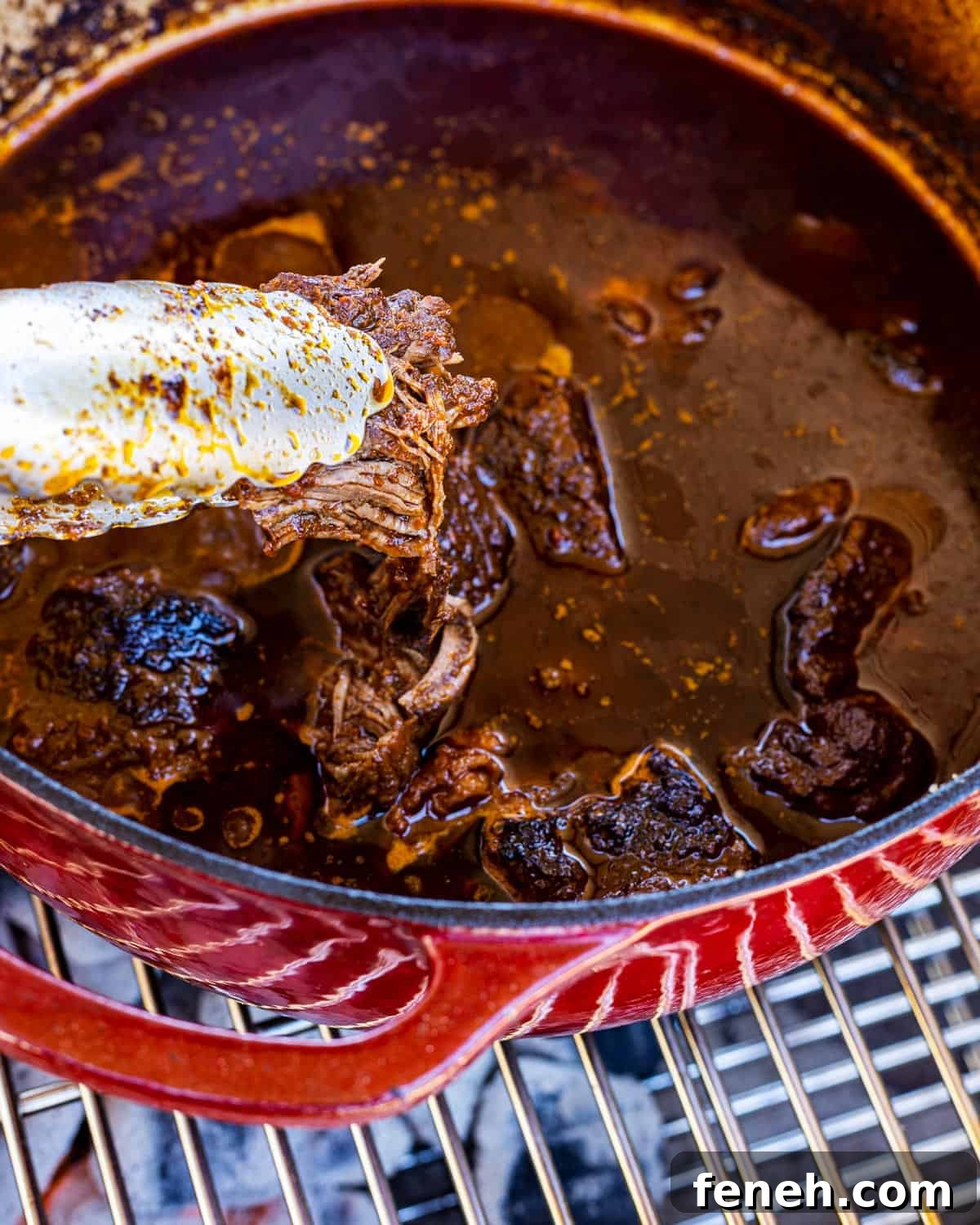 Birria starting to fall apart for Smoked Birria Burgers.