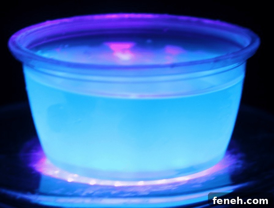 Halloween Shot Recipes and Spooky Shooter Ideas for Parties 11 Blue glow in the dark jello shot.