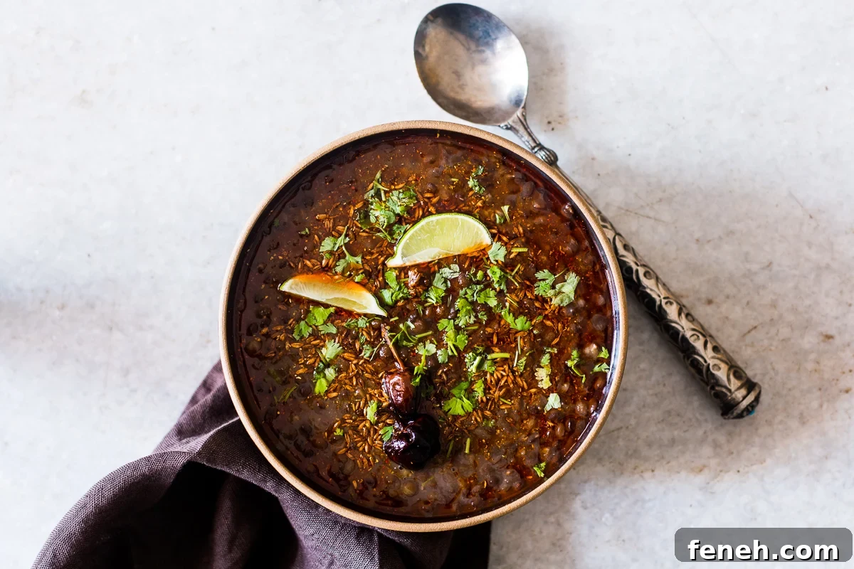 black lentil soup with cilantro and lime