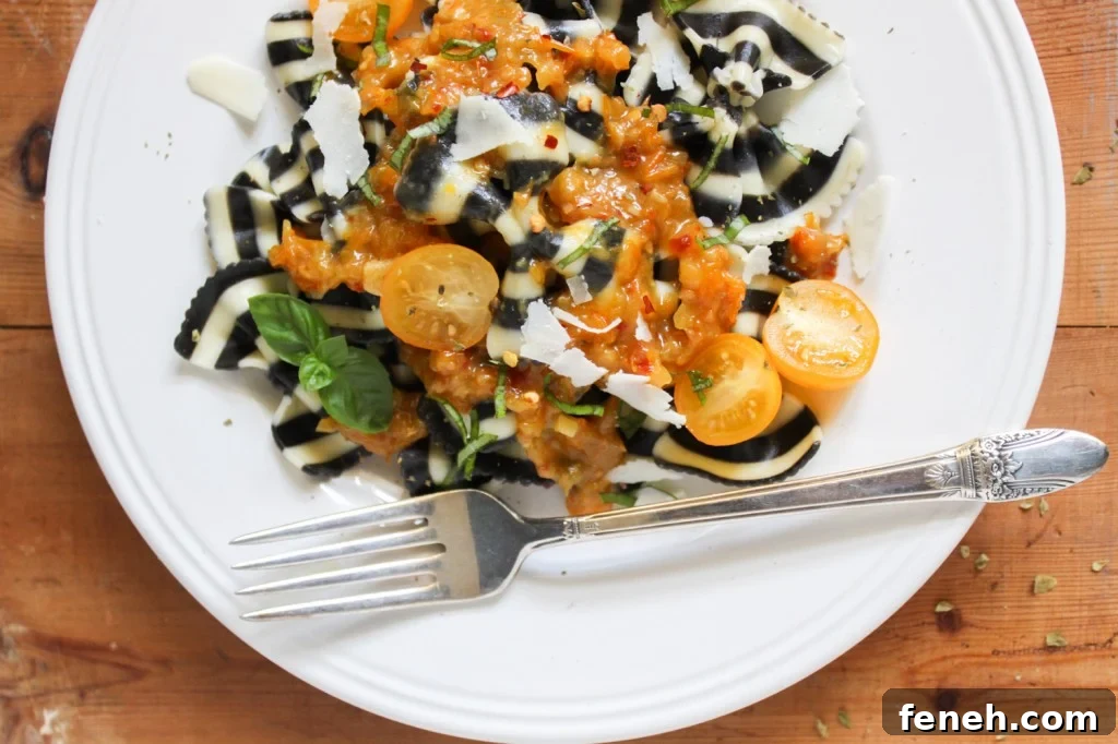 zebra bow tie pasta with yellow tomato sauce