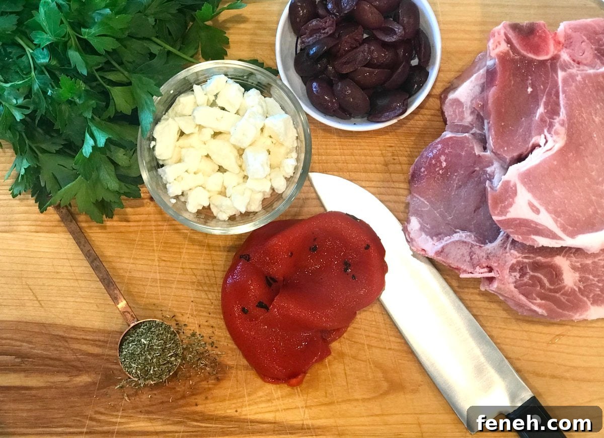 Mediterranean stuffed pork chops ingredients including Kalamata olives, feta, and roasted red peppers.