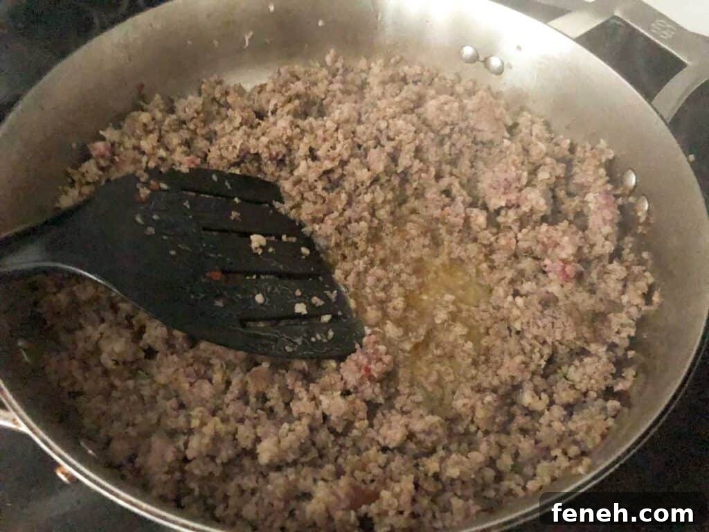 ground sausage in large saucepan