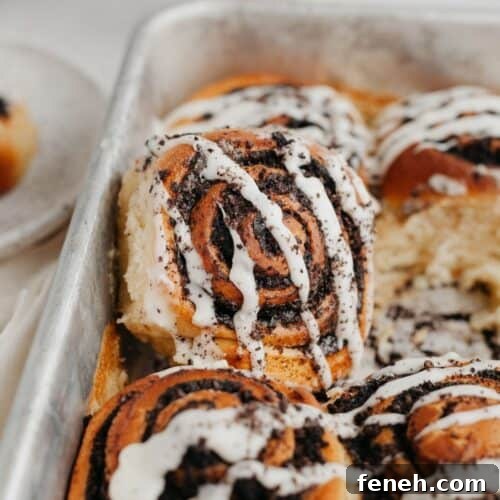 Oreo cinnamon rolls drizzled with a white glaze.