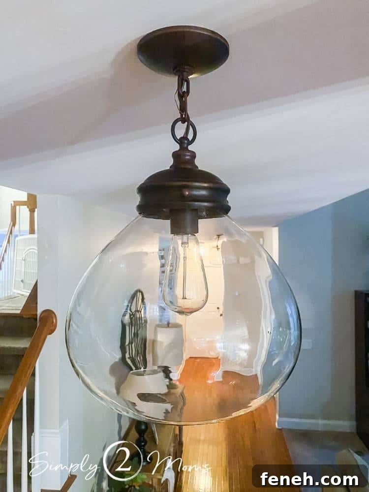 close up of light fixture with light off to show clean glass