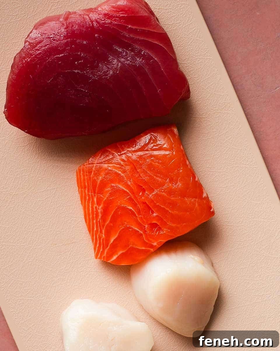 sushi-grade fish on a cutting board