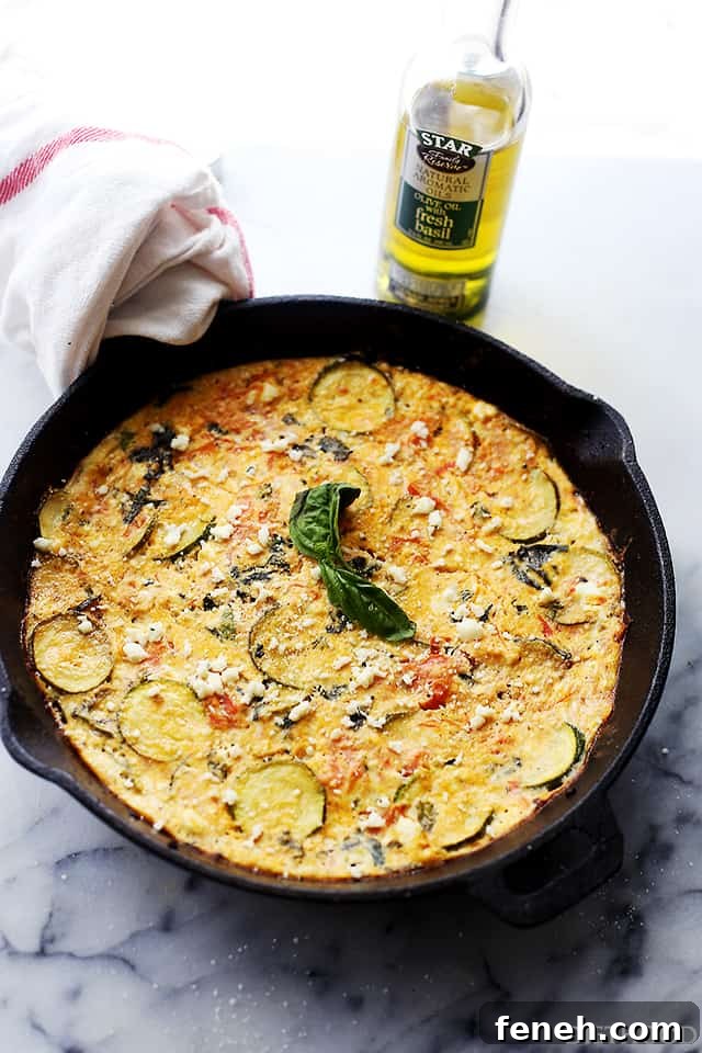 Zucchini frittata in a cast iron skillet.