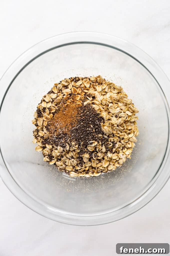 oats, chia seeds and nutmeg in a mixing bowl