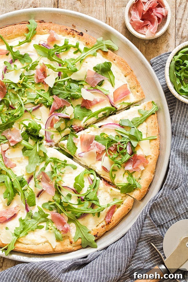 Slice cut out of prosciutto arugula pizza