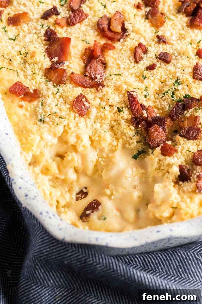 Top view of homemade baked mac and cheese carbonara in a baking dish.