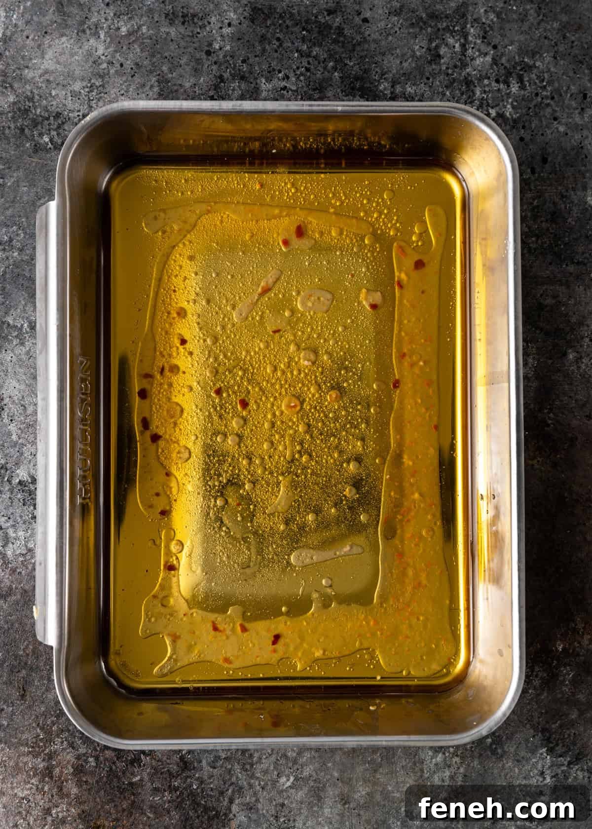 overhead: olive oil dip in a baking dish
