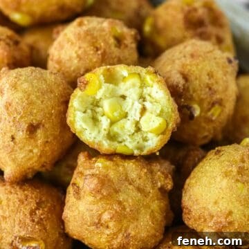 bite taken out of corn nugget stacked on top of others