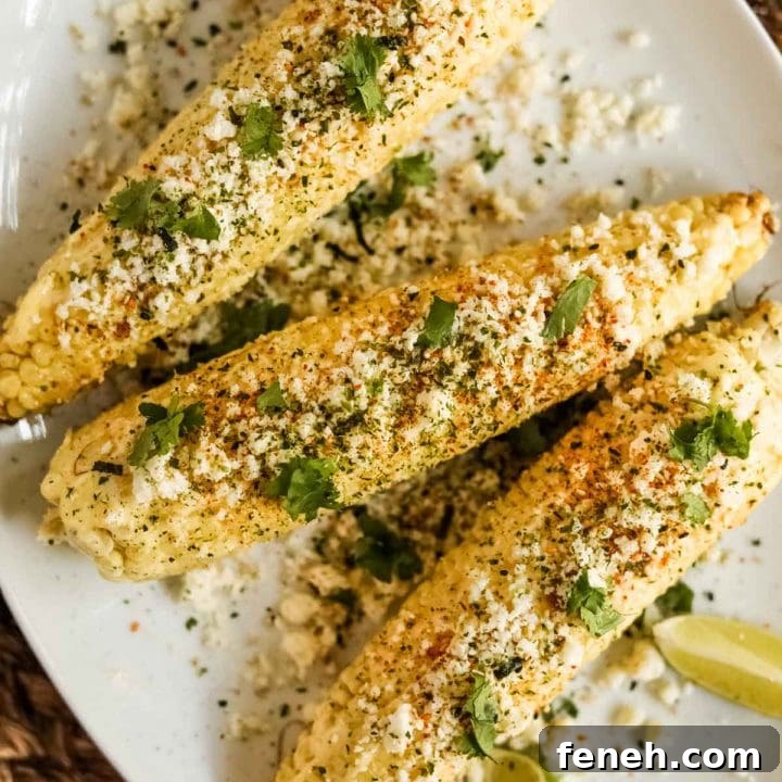 Elote-style corn with furikake and kewpie mayo on a plate flatlay.