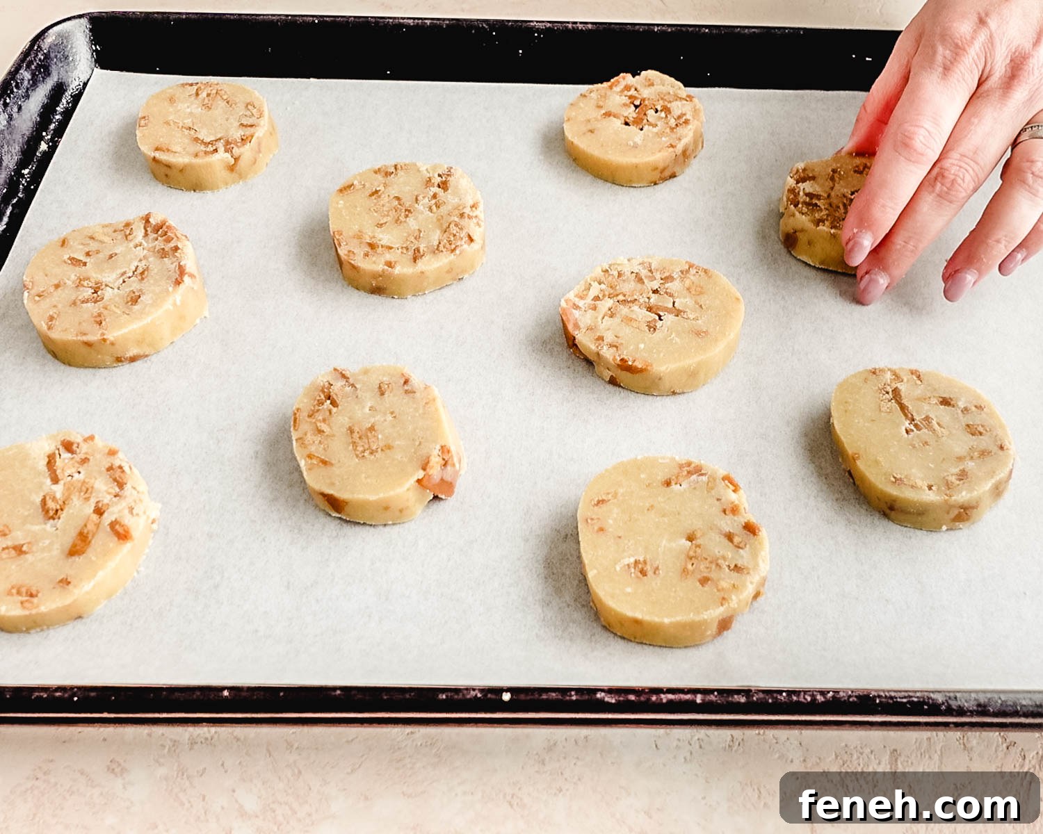 Place cookies 2 inches apart on prepared baking sheet.