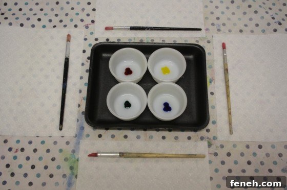water and food colouring in bowls 