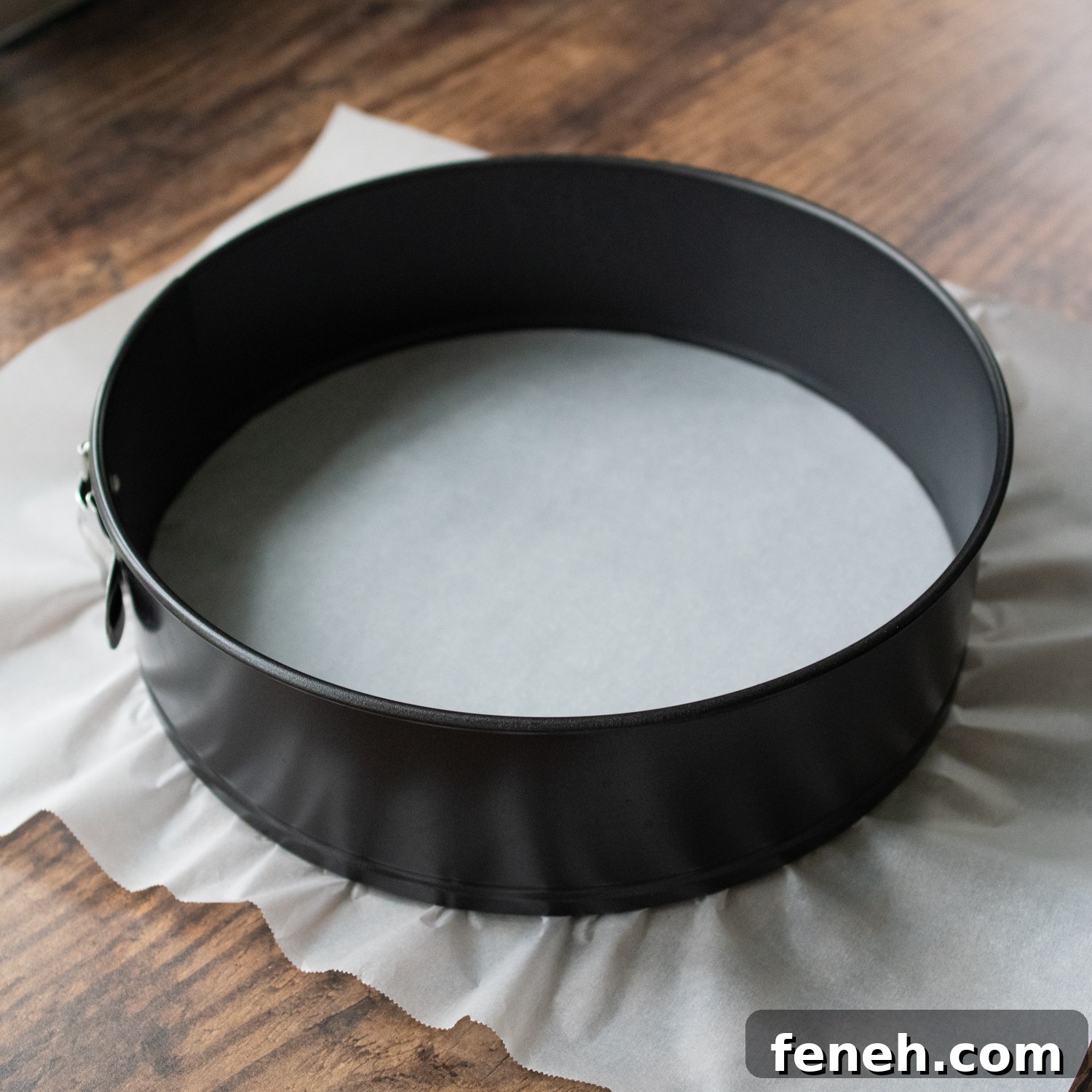 a springform pan with parchment lined on the bottom.