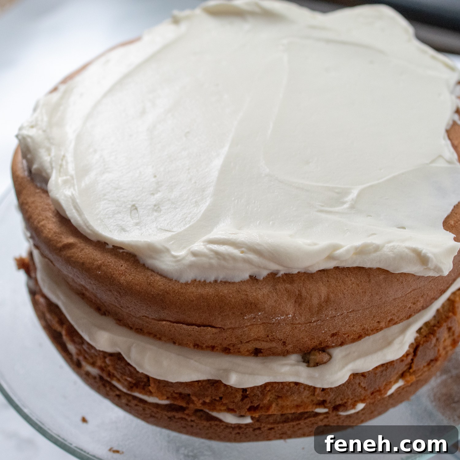 the frosting layered between the pumpkin pie, cake, and blondies.