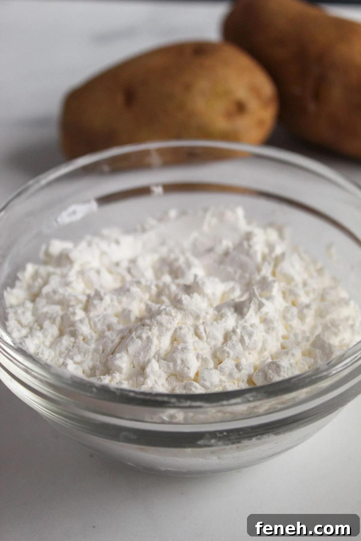 small glass bowl of potato starch