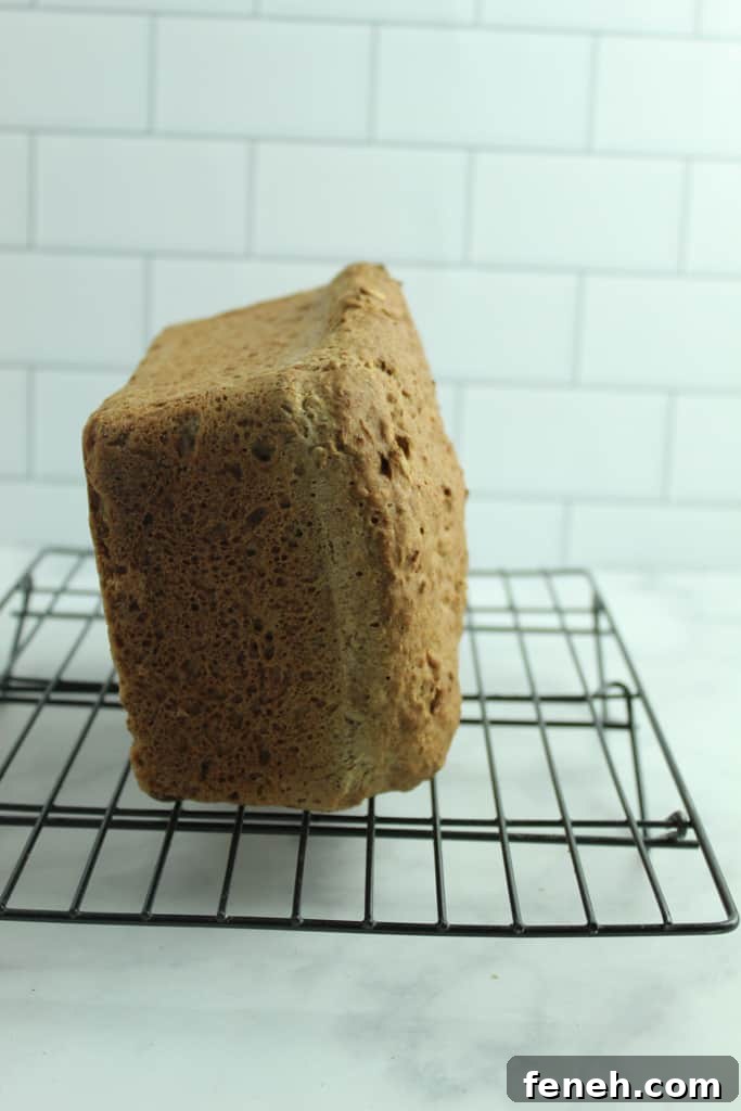 gluten free multigrain bread cooling on its other side