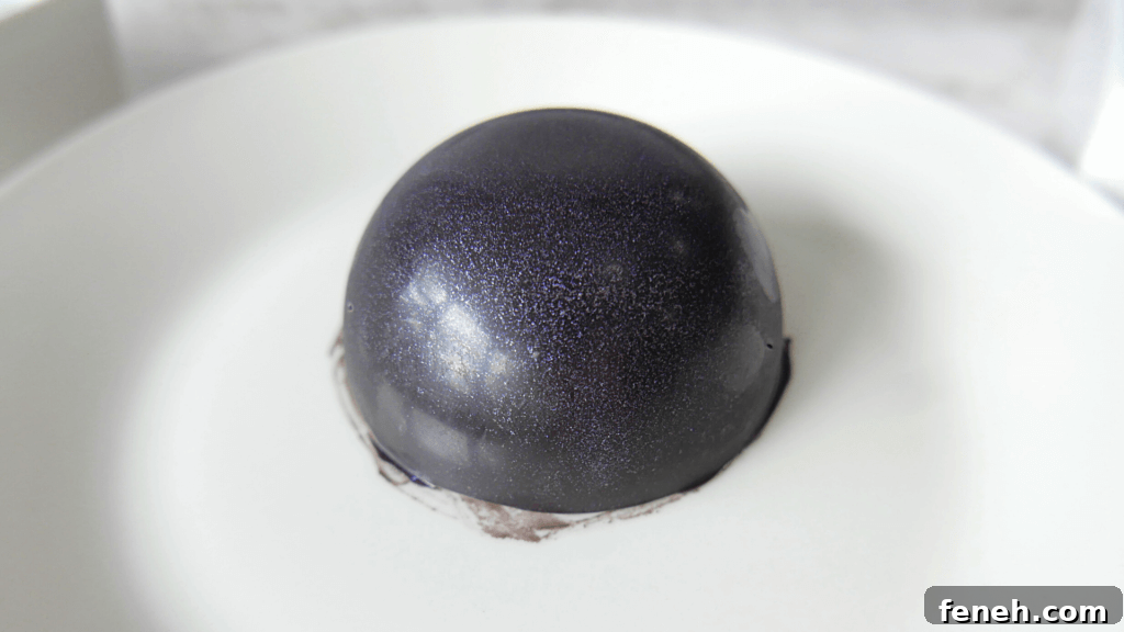 Filling the chocolate sphere