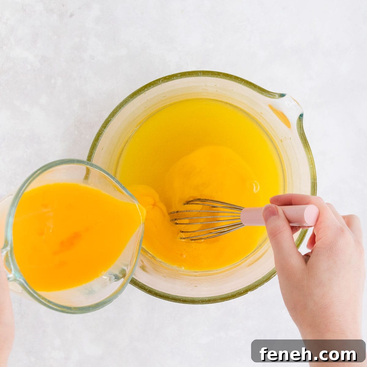 The eggs being added.