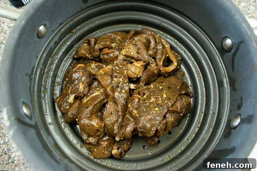 Zesty Lemon Pepper Beef Jerky: Tangy, Savory Snack Guide 11 Lemon pepper jerky straining in colander