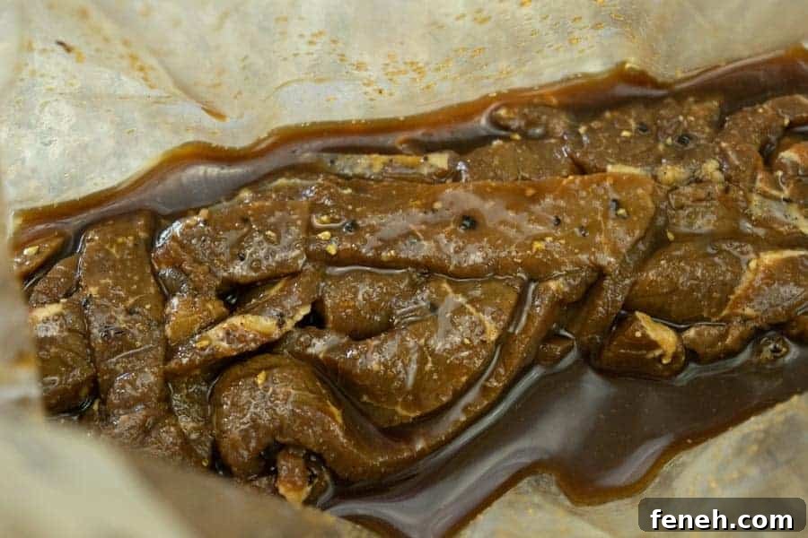 Zesty Lemon Pepper Beef Jerky: Tangy, Savory Snack Guide 10 Lemon pepper jerky marinating in bag
