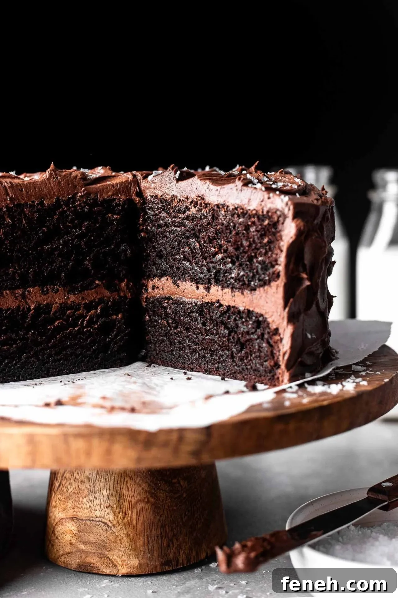 sliced gluten free chocolate cake on cake stand (6)