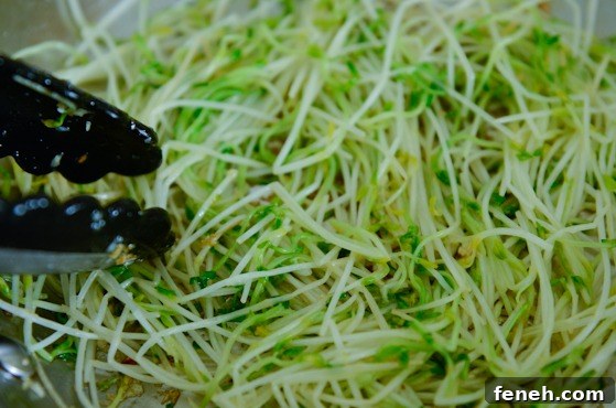 pea sprouts-4 Pea sprouts stir-frying in garlic oil.