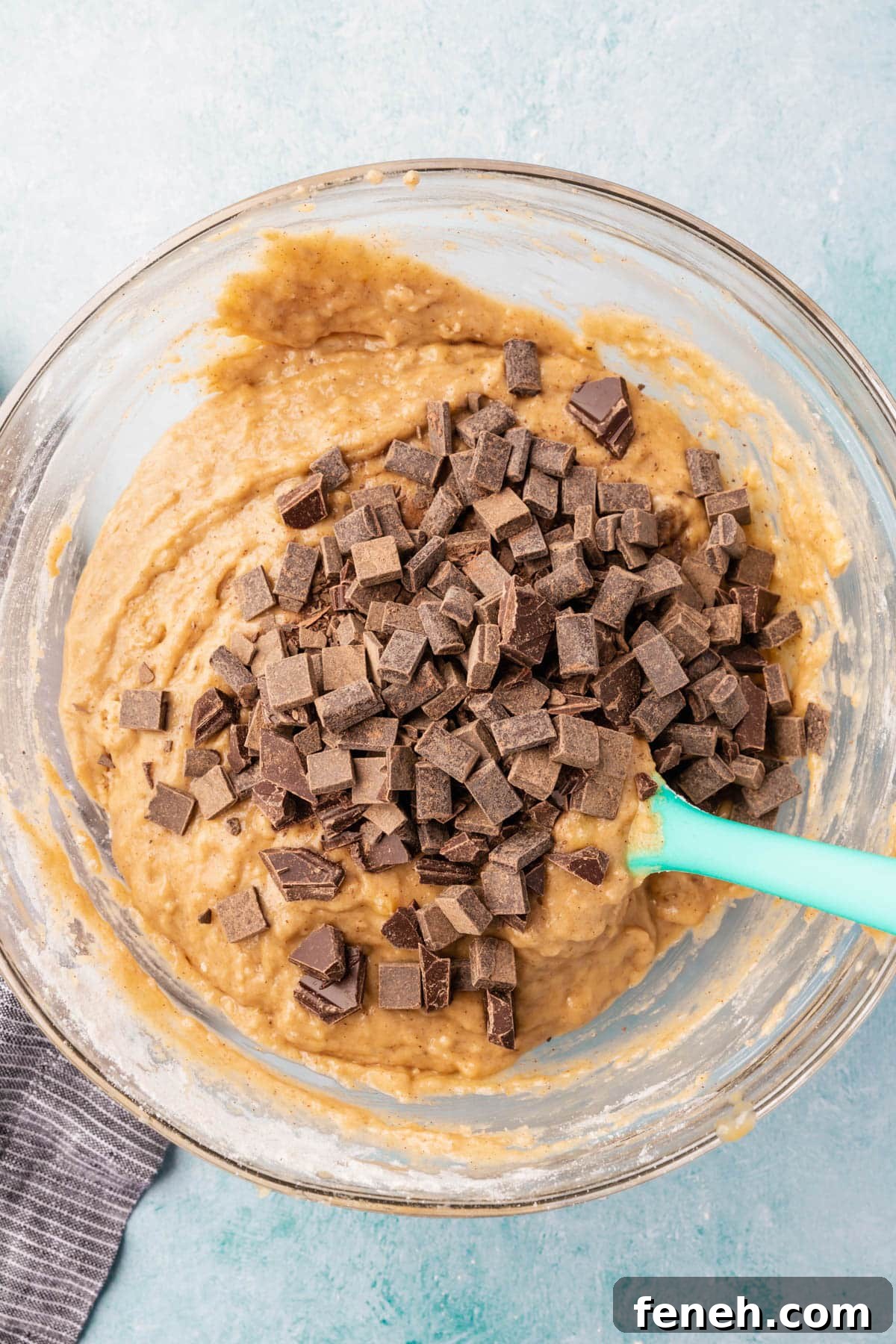 Banana bread batter with chocolate chunks.