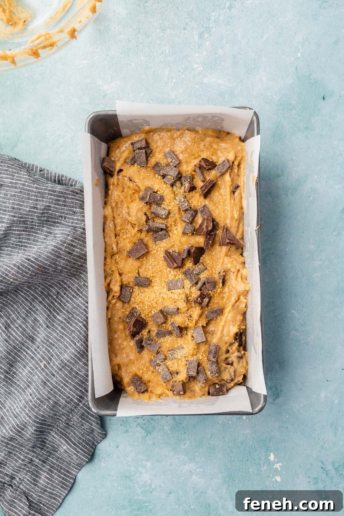 Batter topped with chocolate and turbinado sugar.